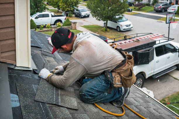 Professional Roof Replacement technician working in Shepherd, MI
